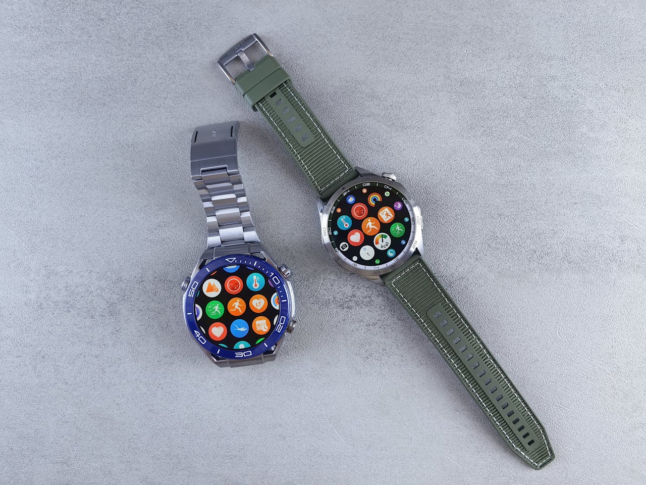 category-01 Close-up of two smartwatches on a gray background highlighting design and technology.